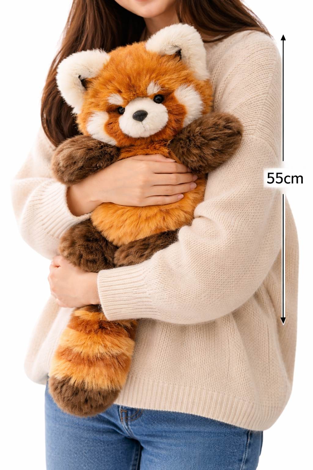 Person holding a plush red panda toy with dimensions indicated